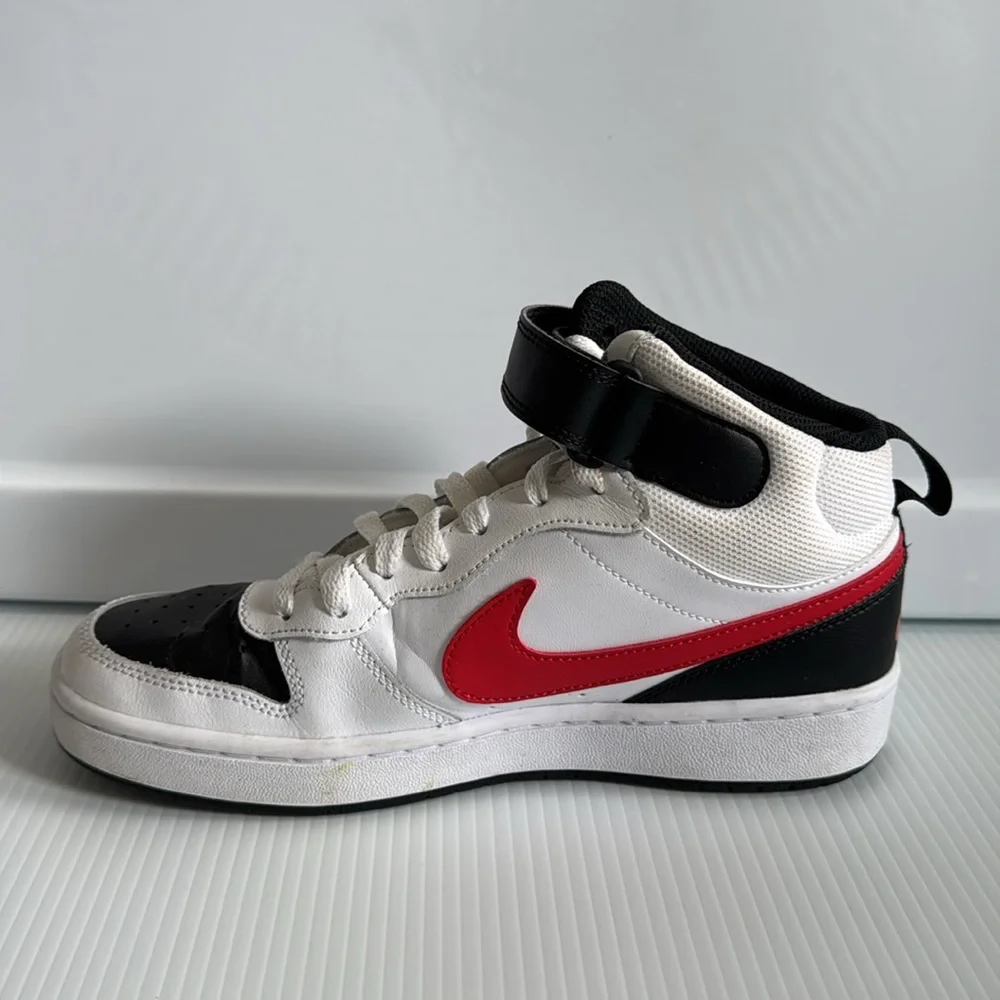 Nike Kids High-Top Sneakers - White, Black, and Red. Size 7